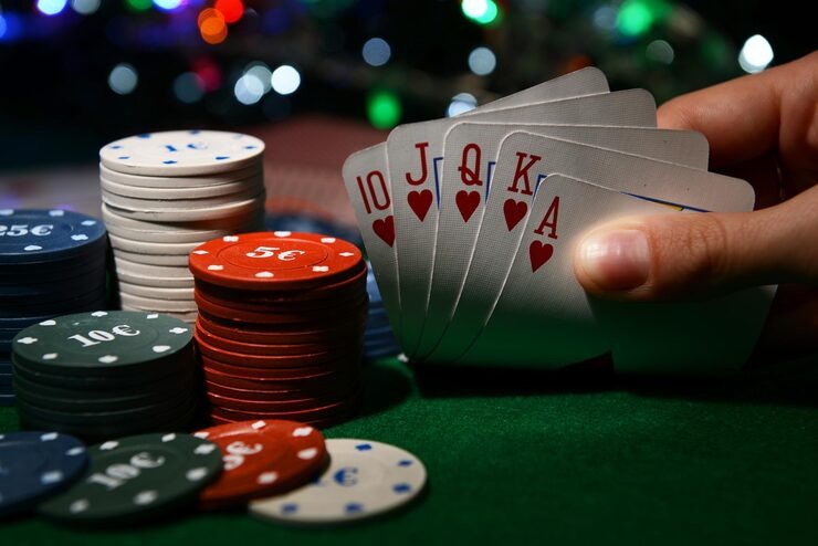 Live Texas Poker dealer table on ovo mobile showing community cards and betting controls